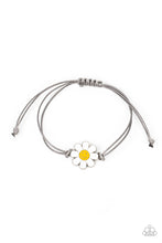 Load image into Gallery viewer, Held together and centered within soft gray cording, a single daisy charm rests. Featuring a silver smiley face in its yellow center, this single flower provides a fashionably, minimalistic statement around the wrist. Features an adjustable sliding knot closure. Sold as one individual bracelet.