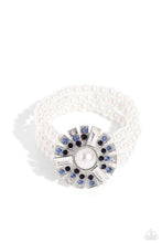 Load image into Gallery viewer, Strung along elastic stretchy bands, three bands of pearls wrap around the wrist. Featured atop the pearly collection, sleek metal bars flare out from a mesmerizing pearl center, creating a stacked blue and white rhinestone-encrusted fringe of fanning frames. A trio of emerald-cut white gem bars are sprinkled across the dazzling display for a sassy finish.