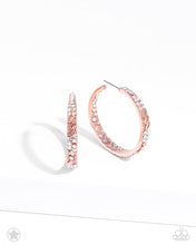 Load image into Gallery viewer, The front facing surface of a chunky shiny copper hoop is dipped in brilliantly sparkling iridescent, peach, and white rhinestones while light-catching texture wraps around the back. The interior of the hoop features the opposite pattern, creating the illusion of a full hoop of blinding rhinestones. Earring attaches to a standard post fitting. Hoop measures 1 3/4" in diameter. Due to its prismatic palette, color may vary. Sold as one pair of hoop earrings.