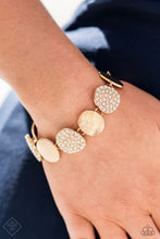 Load image into Gallery viewer, A collection of rounded golden discs wraps around the wrist in a blinding finish. Alternating between rhinestone-encrusted surfaces and strategically textured finishes, the pieces combine to create an elegant statement piece. Features an adjustable clasp closure.