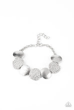 Load image into Gallery viewer, Featuring imperfect oval shapes, a series of delicately scratched and white rhinestone encrusted frames alternate around the wrist for a refined flair. Features an adjustable clasp closure.