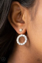 Load image into Gallery viewer, A solitaire white rhinestone attaches to a double-sided post, designed to fasten behind the ear. Encrusted in a ring of glassy white rhinestones, the glittery hoop peeks out beneath the ear for a glamorous look. Earring attaches to a standard post fitting. Sold as one pair of double-sided post earrings.