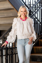 Load image into Gallery viewer, Varying in shape and opacity, a vibrant collection of faceted and smooth Raspberry Sorbet beads join textured silver discs and dainty silver beads along two thin wires, layering into a flamboyant pop of color below the collar. Features an adjustable clasp closure. Includes one pair of matching earrings. Glassy and opaque Raspberry Sorbet crystal-like beads and textured silver accents are threaded along stretchy bands around the wrist, creating vivacious layers. Showing a complete look on a model.