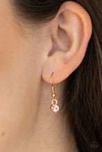 Load image into Gallery viewer, White rhinestone hanging from a copper fish hook earring.