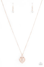 Load image into Gallery viewer, Featuring a dreamy cat's eye stone center, a glistening rose gold locket inspired frame glides along a dainty rose gold chain below the collar for a charming look. Sections of dainty white rhinestones dot the rose gold heart frame, adding flirty hints of shimmer. Features an adjustable clasp closure. Sold as one individual necklace. Includes one pair of matching earrings.