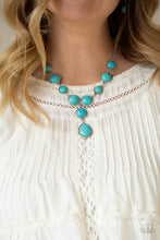 Load image into Gallery viewer, Featuring studded and plain silver frames, small and large turquoise stones delicately alternate below the collar. A refreshing turquoise stone teardrop frame swings from the bottom of a matching stone frame, creating an earthy extended pendant. Features an adjustable clasp closure. Includes one pair of matching earrings.