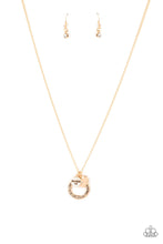 Load image into Gallery viewer, Dotted with a sparkly white rhinestone, a dainty gold heart joins a gold ring stamped in the biblical passage, "Trust in the Lord with all thine heart," and a gold disc stamped in, "Proverbs 3:5," along the bottom of a lengthened gold chain, creating an inspirational pendant. Features an adjustable clasp closure. Sold as one individual necklace. Includes one pair of matching earrings.