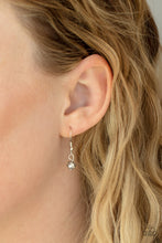 Load image into Gallery viewer, Small bead hanging from a silver fish hook earring.