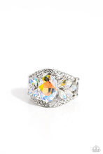 Load image into Gallery viewer, Bordered in dainty rows of glassy white rhinestones, leafy iridescent rhinestones bloom from a dramatically oversized iridescent rhinestone that coalesces into a glamorous centerpiece atop the finger. Features a stretchy band for a flexible fit. Due to its prismatic palette, color may vary. Sold as one individual ring.