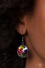 Load image into Gallery viewer, A single large, oil spill rhinestone hanging from a fish hook earring in a gunmetal setting.