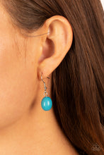Load image into Gallery viewer, Blue bead hanging from a silver fish hook earring.