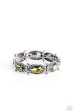 Load image into Gallery viewer, Glittery oil spill gems are pressed into silver studded, marquise-cut frames, titled on its side. Separated by dainty hematite rhinestones encased in sleek silver frames, the sparkly collection is threaded along elastic stretchy bands for a dramatic look around the wrist. Due to its prismatic palette, color may vary. Sold as one individual bracelet.