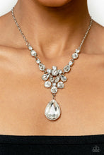 Load image into Gallery viewer, Adorned with a dainty silver chain, a twinkling collection of white, reflective teardrops, rhinestones and marquise-cut gems glitter down the chest. Hanging at the bottom of the glittery collection, an oversized teardrop gem swings for some eye-catching movement and shine. Features an adjustable clasp closure. Sold as one individual necklace. Includes one pair of matching earrings.