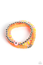 Load image into Gallery viewer, Varying in colorful shades, orange, pink, green, white, and yellow rubber discs pair with shiny silver beads and silver accents creating colorful layers across the wrist. Featured on the silver-beaded bracelet, a rubber shape with an eye-like design contributes an additional shade of pink to the design. Sold as one set of three bracelets.