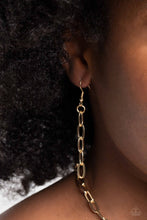 Load image into Gallery viewer, Long gold oval links hanging from a gold fish hook earring.
