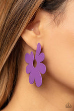 Load image into Gallery viewer, Asymmetrical, oversized purple petals bloom into an abstract flower hoop for a fashionable, attention-grabbing pop of color around the ear. Earring attaches to a standard post fitting. Hoop measures approximately 2" in diameter. Sold as one pair of hoop earrings.