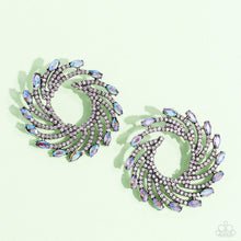Load image into Gallery viewer, Shimmery strands of silver spin out from an airy center, creating an exaggerated firework-like display at the ear. An explosion of dainty white rhinestones lines the swirls and curves of the shimmery display leading the eye to the collection of colorfully reflective marquise-cut gems at its ends. Each colorfully reflective marquise-cut gem curls around the ear in a clock-like manner, creating additional eye-catching dimension.