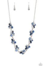 Load image into Gallery viewer, An eclectic collection of white and blue round rhinestones in varying sizes and marquise-cut gems in a blue shade cluster around the collar in high-sheen silver frames. Patterned in an abstract manner, the clusters interlock together, emitting light from every faceted angle. Features an adjustable clasp closure. Includes one pair of matching earrings.