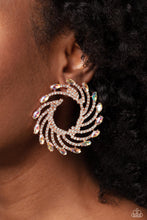 Load image into Gallery viewer, Shimmery strands of shiny copper spin out from an airy center, creating an exaggerated firework-like display at the ear. An explosion of dainty white rhinestones lines the swirls and curves of the shimmery display leading the eye to the collection of iridescent marquise-cut gems at its ends. Each iridescent marquise-cut gem curls around the ear in a clock-like manner, creating additional eye-catching dimension. Earring attaches to a standard post fitting. Due to its prismatic palette, color may vary.