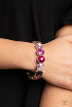 Load image into Gallery viewer, Faceted gems in colorful shades featuring varying shimmers and iridescence are pressed into sleek silver frames. The glittery frames are threaded along elastic stretchy bands, creating a glamorous look around the wrist. Due to its prismatic palette, color may vary. Sold as one individual bracelet.