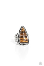 Load image into Gallery viewer, An oversized tiger's eye triangle stone is nestled inside a silver frame studded and embellished in antiqued silver details for an authentic finish. Features a stretchy band for a flexible fit. As the stone elements in this piece are natural, some color variation is normal. Sold as one individual ring.