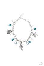 Load image into Gallery viewer, Dainty baroque pearls, clear Harbor Blue and Waterspout faceted beads in silver frames, intricate silver seahorse, starfish, and sea scallop seashell charms, and milky Harbor Blue and Waterspout teardrop beads swing from a silver link chain, creating a beachy fringe around the wrist. Features an adjustable clasp closure. Sold as one individual bracelet.