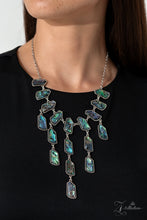 Load image into Gallery viewer, Abalone shells swirled in dreamy, reflective hues of blue, purple, and green are cut into abstract geometric shapes and set into studded silver frames. Silver chain links connect a row of shells that bows along the neckline, anchoring a cascade of pearlescent tassels that taper into a shimmery fringe. Features an adjustable clasp closure. Due to its prismatic palette, color may vary. Sold as one individual necklace. Includes one pair of matching earrings.