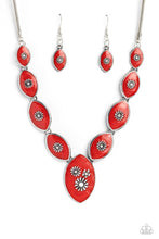 Load image into Gallery viewer, Featuring vibrant red paint, a collection of silver marquise-shaped frames gradually increase in size as they taper below the collar in a timeless fashion on a silver snake chain. Each frame is embossed with a delicate silver flower with a white rhinestone center, with the centermost pendant featuring three flowers, creating a glamorous array of whimsicality. Features an adjustable clasp closure. Sold as one individual necklace. Includes one pair of matching earrings.