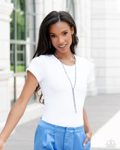 Load image into Gallery viewer, Featuring sleek square fittings, two strands of glittery, dainty multicolored blue rhinestones connect down the chest for a refined centerpiece. The interconnected rows delicately give way to free falling multicolored blue layers, creating additional strands of glitzy movement. Features an adjustable clasp closure. Sold as one individual necklace. Includes one pair of matching earrings.