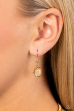 Load image into Gallery viewer, Encased in sleek gold casings, oversized white pearls and shimmery beads lay horizontally across the chest on curved horseshoe-like frames. Delicately stamped in golden studs, the abstract frames swing from the bottom of a classic gold chain for a monochromatic, sophisticated look. Features an adjustable clasp closure. Sold as one individual necklace. Includes one pair of matching earrings.