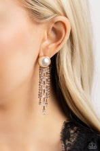 Load image into Gallery viewer, Gradually decreasing in length, strand after strand of glittery white rhinestones and emerald-cut white gems stream from gold fittings, creating a refined fringe that falls effortlessly from a solitaire oversized pearl for an elegant centerpiece. Earring attaches to a standard post fitting. Sold as one pair of post earrings.