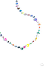 Load image into Gallery viewer, Infused on an invisible wire, an assortment of multicolored beads, acrylics, and chiseled stones alternating with dainty silver rods coalesce around the neckline for a youthful pop of color. Features an adjustable clasp closure. As the stone elements in this piece are natural, some color variation is normal. Sold as one individual necklace. Includes one pair of matching earrings.