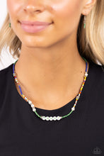 Load image into Gallery viewer, Infused along an invisible string, white pearls, multicolored seed beads, silver accents, and white beads spelling out the word "HAPPY" in green lettering wrap around the neckline for an optimistic, youthful display. Features an adjustable clasp closure. Sold as one individual necklace. Includes one pair of matching earrings.