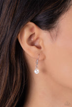 Load image into Gallery viewer, Featuring silver square fittings, white rhinestones cascade into two layers below the collar adding glitzy movement to the sparkling centerpiece. Infused along the uppermost chain, a glitzy collection of pearl-dotted flowers with rose, blue, amethyst, yellow, and peachy rhinestone petals creates a splash of whimsical color. Features an adjustable clasp closure. Featured inside The Preview at Made for More! Sold as one individual necklace. Includes one pair of matching earrings.