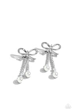Load image into Gallery viewer, Adorned in sparkling white rhinestones, high-sheen bands of silver curl and loop into a stunning bow charm, creating a classy statement at the ear. White rhinestones encased in scalloped silver fittings, featuring white pearls that slowly increase in size dangle from the bow charm adding a refined tassel to the stunning display. Earring attaches to a standard post fitting. Sold as one pair of post earrings.