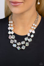 Load image into Gallery viewer, Featuring a subtle scratch surface, a bubbly collection of white pearls, abstract iridescent beads, and sparkly crystal-like iridescent beads are threaded along metallic rods that trickle in a two-layer display, creating an elegantly effervescent display below the collar. Features an adjustable clasp closure. Due to its prismatic palette, color may vary. Sold as one individual necklace. Includes one pair of matching earrings.