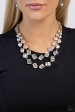 Load image into Gallery viewer, Featuring a subtle scratch surface, a bubbly collection of silver pearls, abstract iridescent beads, and sparkly crystal-like iridescent beads are threaded along metallic rods that trickle in a two-layer display, creating an elegantly effervescent display below the collar. Features an adjustable clasp closure. Due to its prismatic palette, color may vary. Sold as one individual necklace. Includes one pair of matching earrings.