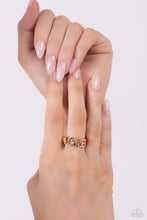Load image into Gallery viewer, Glistening silver letters arc across the finger, forming the word "LOVE" for a causally romantic finish. The letter "O" features a Classic Green-painted peace sign, the letter "V" features various shades of multicolored rhinestones, while a Pink Peacock-painted heart caps the word, infusing the design with color. Features a dainty stretchy band for a flexible fit. Sold as one individual ring.