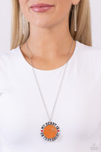 Load image into Gallery viewer, Dangling from an extended dainty silver chain, an oversized orange-painted basketball pendant features the phrase "My Heart is on that Court" in all caps and black lettering as it wraps around the ball. Red-painted hearts separate "My heart is" from "on that Court" for a sport-loving-inspired finish. Features an adjustable clasp closure. Sold as one individual necklace. Includes one pair of matching earrings.