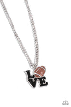 Load image into Gallery viewer, Gliding along a classic silver chain, a black-painted word pendant spells out the word "LOVE" with a brown-painted and silver-detailed football replacing the "O" for a sports-inspired centerpiece. Features an adjustable clasp closure. Sold as one individual necklace. Includes one pair of matching earrings.