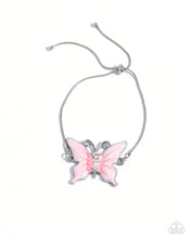 Load image into Gallery viewer, Featuring a glossy finish, an asymmetrical pink-painted butterfly patterned with accents of darker pink whimsically dances along a dainty silver snake chain. Three white gems decrease in size along the butterfly's body for a radiant finish around the wrist. Features an adjustable sliding knot closure. Sold as one individual bracelet.
