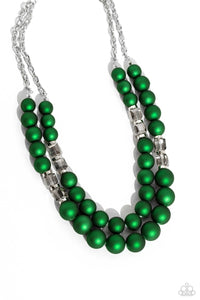 Two strands of oversized emerald green beads featuring a subtle shimmer, silver accents, and clear gray cubed beads stretch around the wrist, creating refined, colorful layers.  The Complete Look! Necklace: "Shopaholic Season - Green"