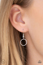 Load image into Gallery viewer, Silver circle hanging from a fish hook earring.
