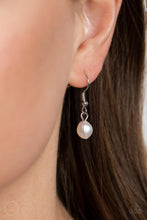 Load image into Gallery viewer, Small pearl hanging from a fish hook earring.
