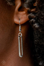 Load image into Gallery viewer, Silver paper clip like shape hanging from a silver fish hook earring.
