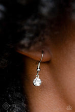 Load image into Gallery viewer, Small rhinestone hanging from a silver fish hook earring.
