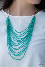 Load image into Gallery viewer, Row after row of vivacious turquoise seed beads cascade down the chest, creating summery layers. Features an adjustable clasp closure.  Sold as one individual necklace. Includes one pair of matching earrings.
