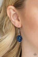 Load image into Gallery viewer, Blue crystal bead hanging from a silver fish hook earring.
