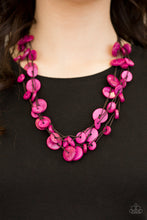 Load image into Gallery viewer, Tinted in a vivacious pink finish, distressed wooden discs trickle along strands of knotted brown cording, creating colorful layers below the collar for a seasonal vibe. Features a button-loop closure. Sold as one individual necklace. Includes one pair of matching earrings.
