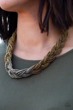 Load image into Gallery viewer, Strands of brass seed beads create an indigenous braid below the collar. The brass seed beads gradually morph into metallic silver beads at the center for a chic contrasting look. Features an adjustable clasp closure.  Sold as one individual necklace. Includes one pair of matching earrings.
